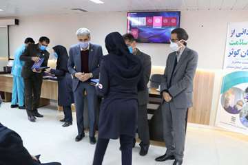 آیین قدردانی از افتخارآفرینان حماسه و ایثار در دوران کرونا ویروس بیمارستان کوثر سمنان99.09.11 